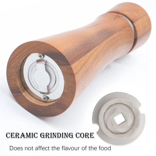Acacia wood pepper grinder with ceramic grinding mechanism for salt and spices, showing natural wood grain texture