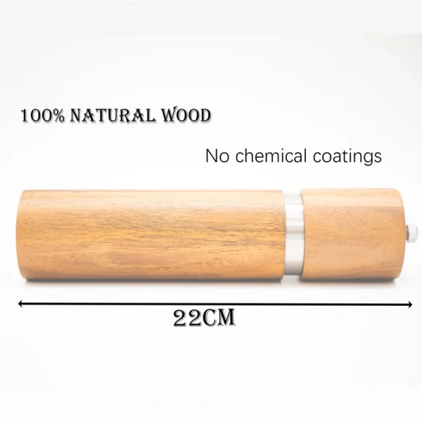 Acacia wood pepper grinder with ceramic grinding mechanism for salt and spices, showing natural wood grain texture.