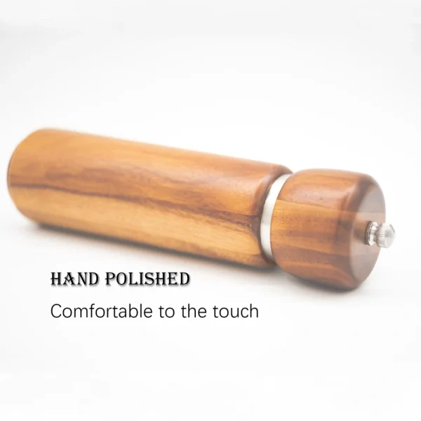 Acacia wood pepper grinder with ceramic grinding mechanism for salt and spices, showing natural wood grain texture