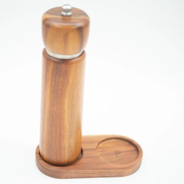 Acacia wood salt and pepper grinders with ceramic grinding cores, displayed on a matching wooden base.