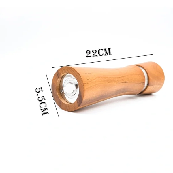 Acacia wood pepper grinder with ceramic grinding mechanism for salt and spices, showing natural wood grain texture